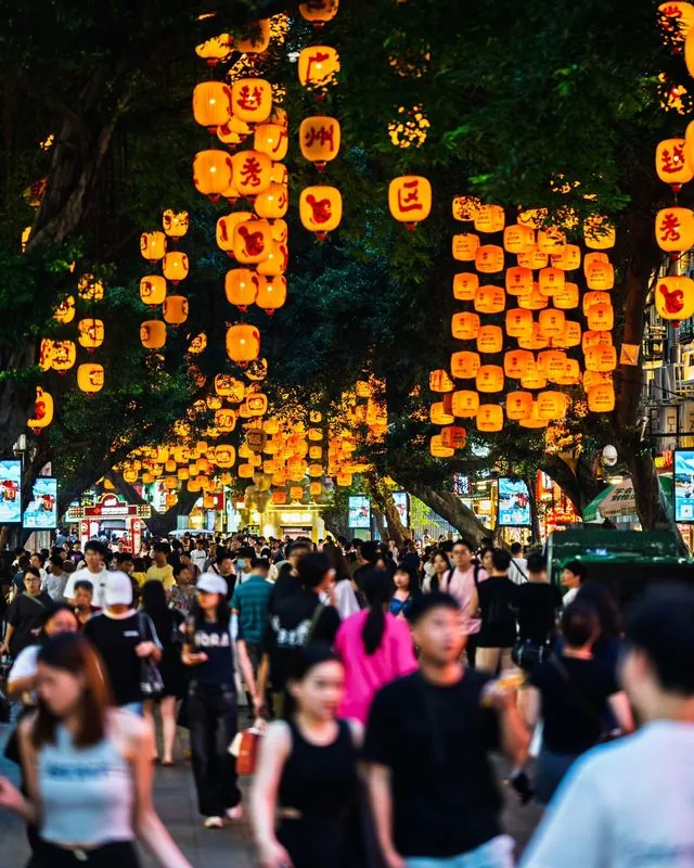 beijng road is a bustling busy street, in guangzhou, where domestic tourists come to stroll the wide pedestrian road and consume the abundance of joys