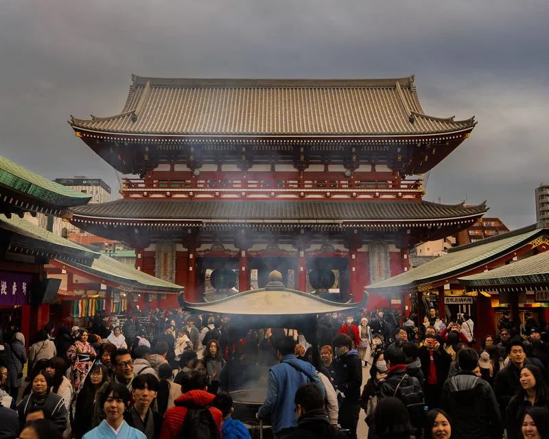 a pale blue kimono in a sea of winter jackets